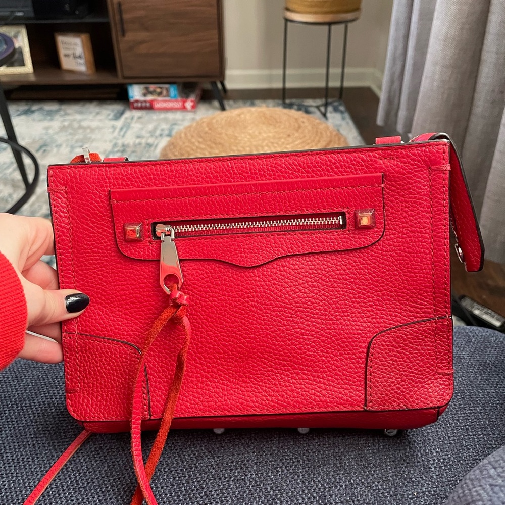 Lightly used Rebecca Minkoff clutch. Genuine leather. No signs of wear.